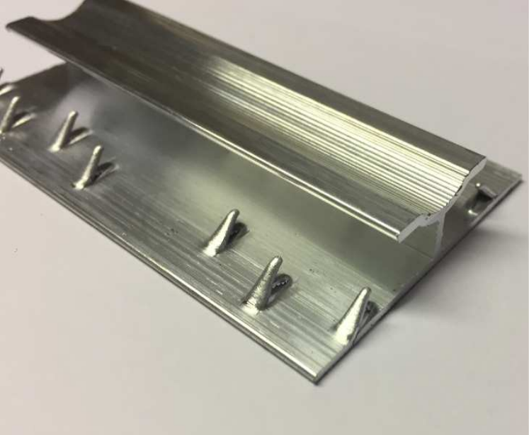Dual Edge Carpet Door Bar